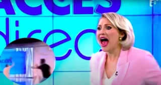 Irruzione in diretta tv: una donna lancia un sasso contro la conduttrice