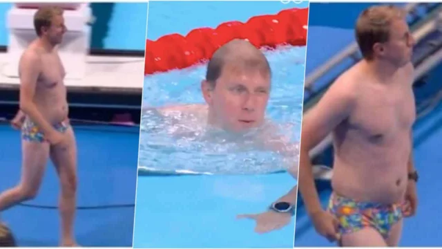 Olimpiadi, un uomo in costume si tuffa in piscina durante la gara